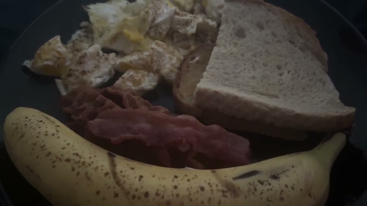 Sour dough toast, bacon, eggs and a banana for breakfast