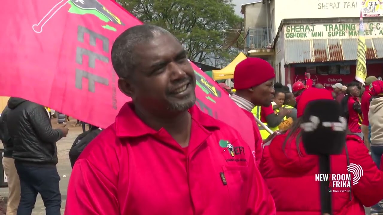 EFF's Godrich Gardee speaks to Mweli Masilela as protest against King Mswati III picks up steam