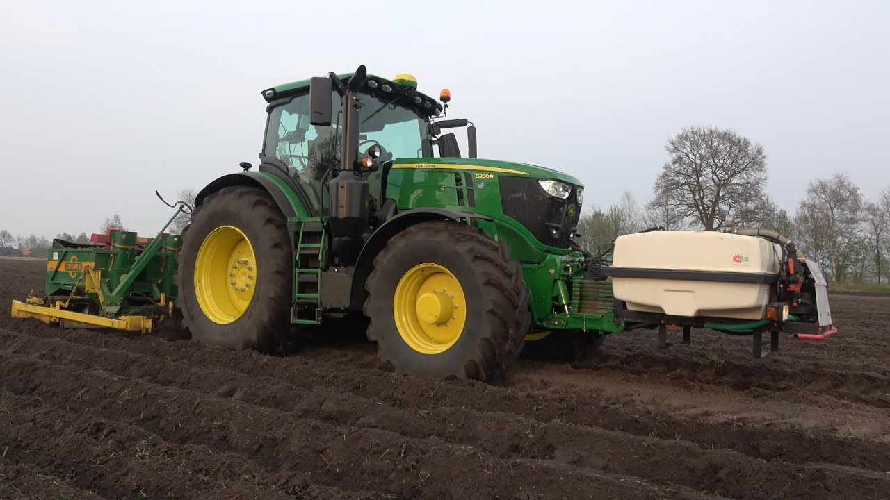 Aardappels poten met nieuwe John Deere 6250R en een Cramer aardappelpootmachine (2018)