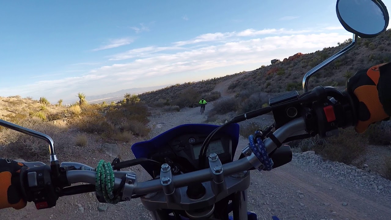 Yamaha XT250 following a ebike Haibike Sduro, down the trail