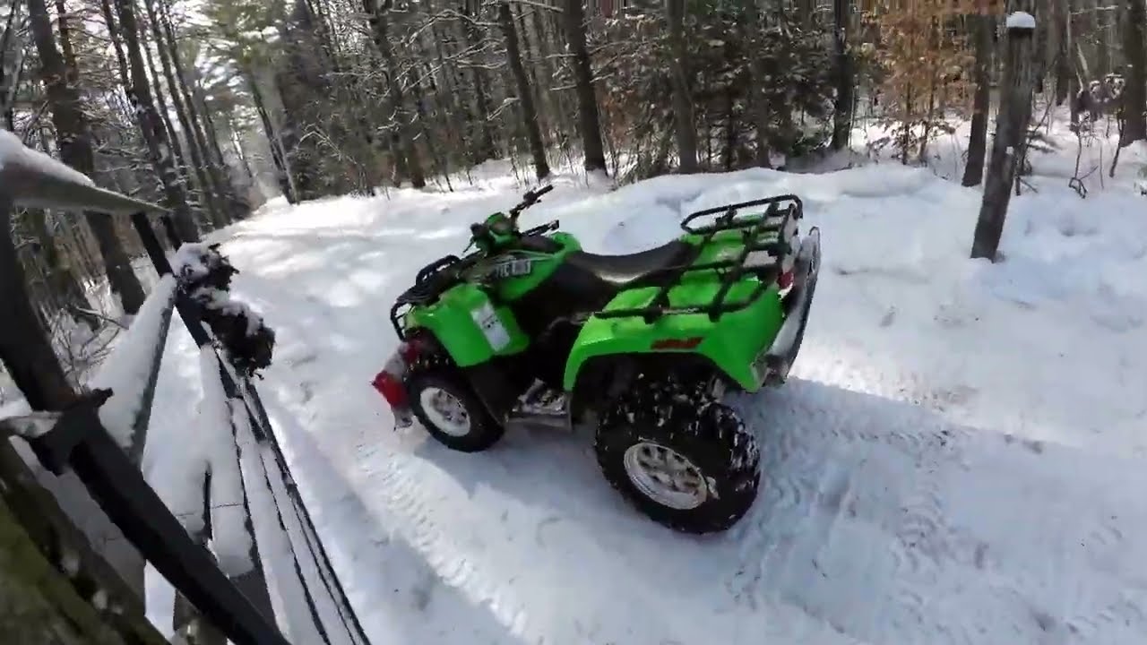Arctic Cat ATV Plowing Light Snow