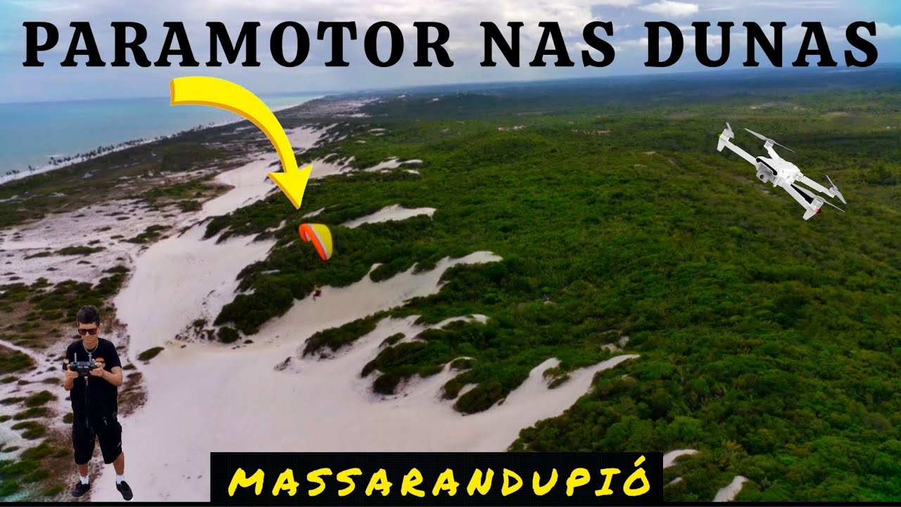 FLAGRA PARAMOTOR POUSANDO NAS DUNAS
