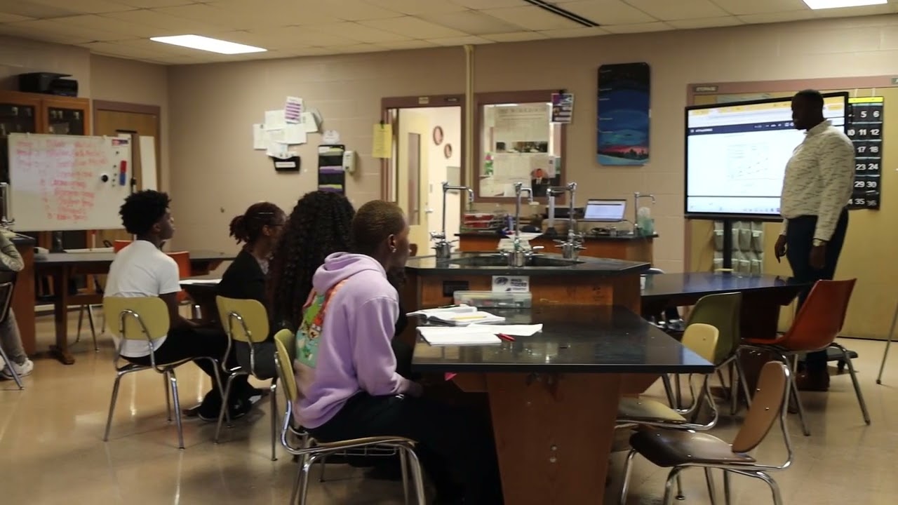 Mr. Aaron teaching to his students.