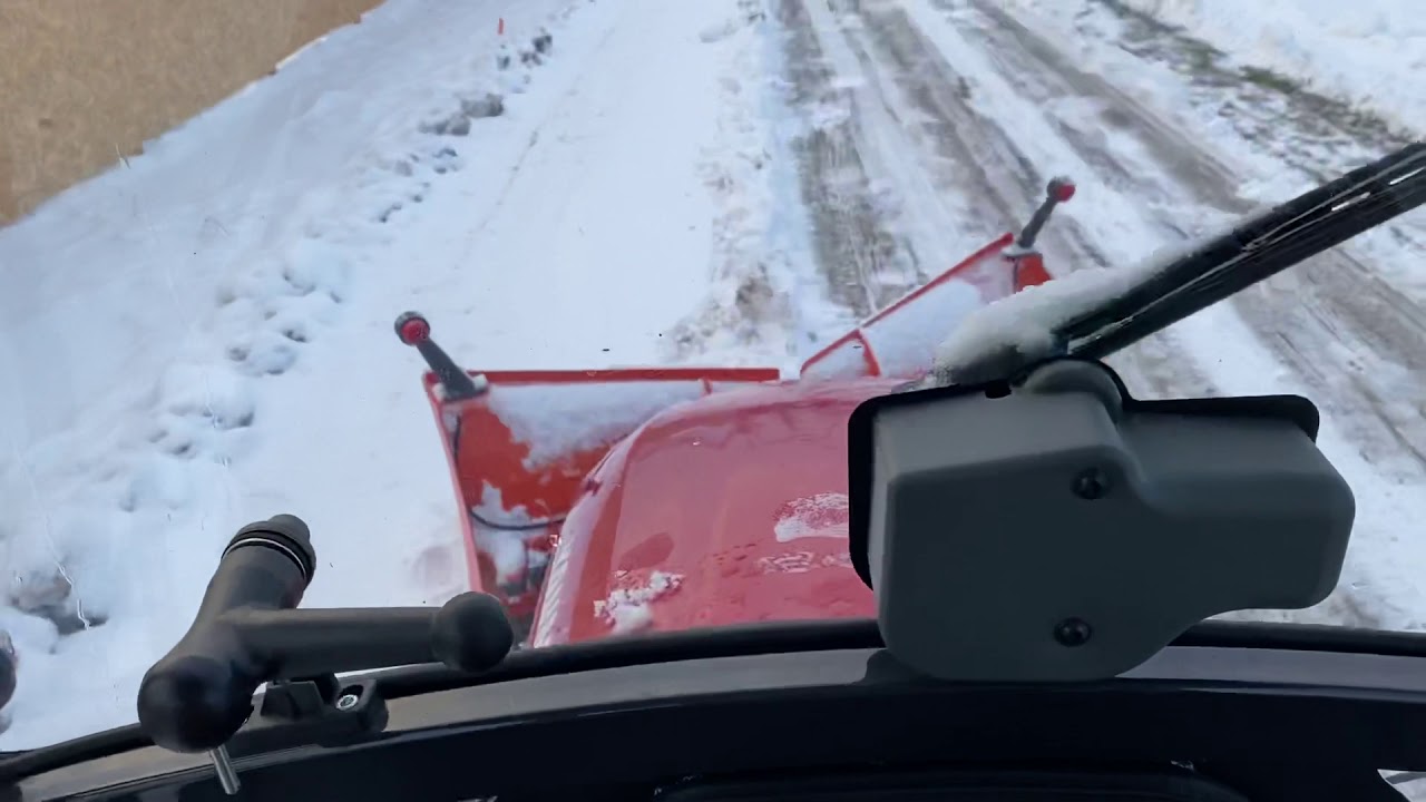 Yanmar SA424 - kabina - praca podczas odśnieżania z poziomu operatora