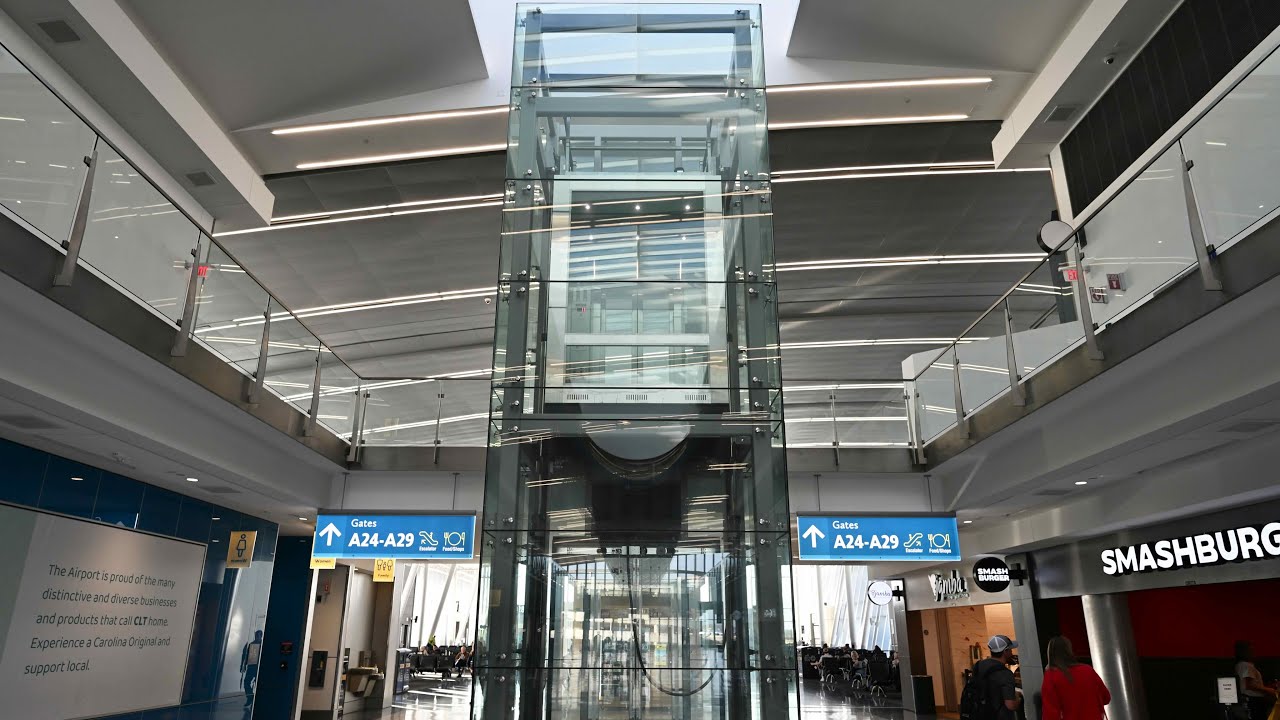 Charlotte, NC: Epic MEI Hydraulic Glass Elevator at the A Gates Charlotte Airport