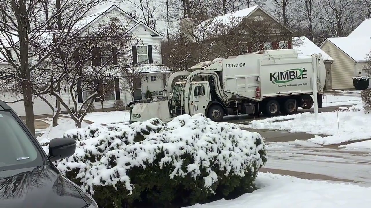 Two Kimble garbage trucks at once 