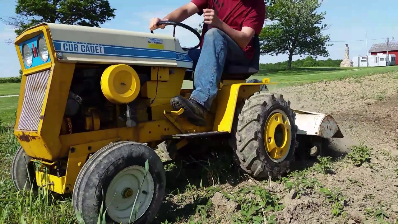 Cub cabet 124 rototilling the garden at the farm