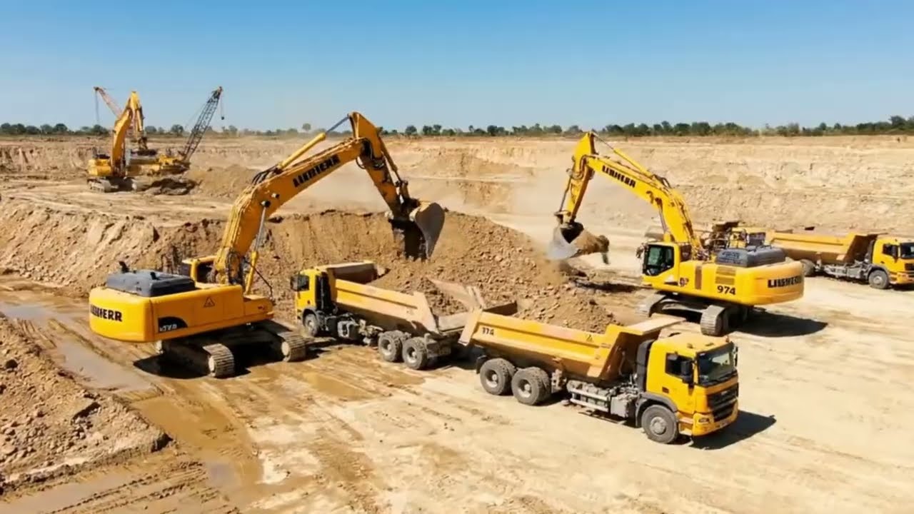 Action Videos of the Liebherr R9350 Excavator Loading Caterpillar Dumper