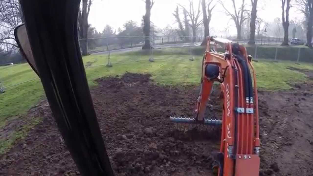 Kubota U25-3 Mini Digger / Excavator Using A Rake Attachment