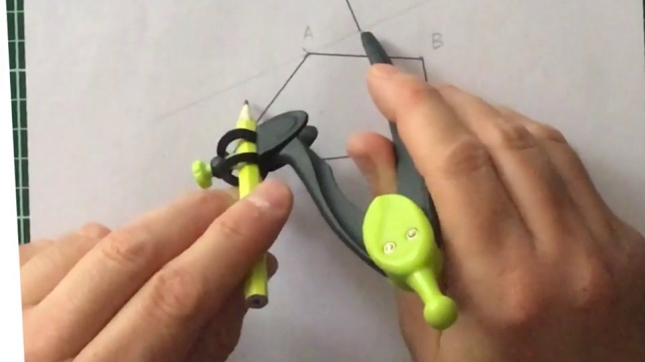 Construction du symétrique d'une figure par rapport à un axe (sans quadrillage) : Exercice 2