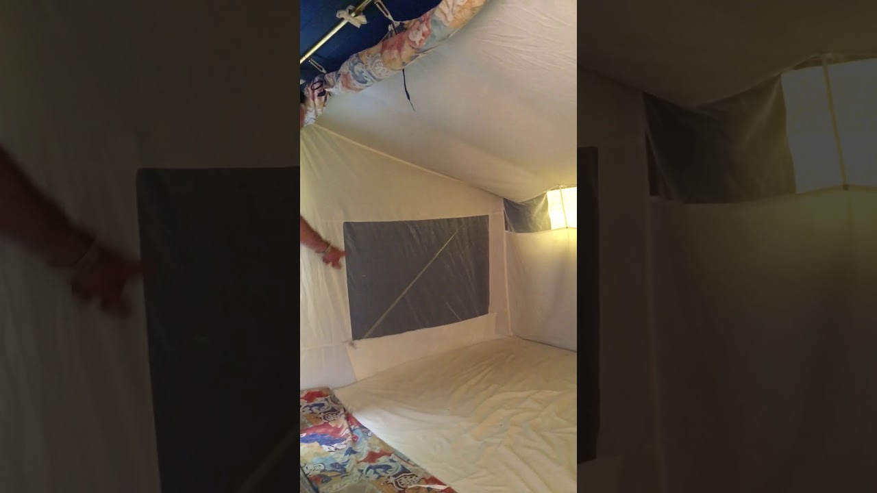 Setting up a trailer tent (Conway classic) 2000 pt 17