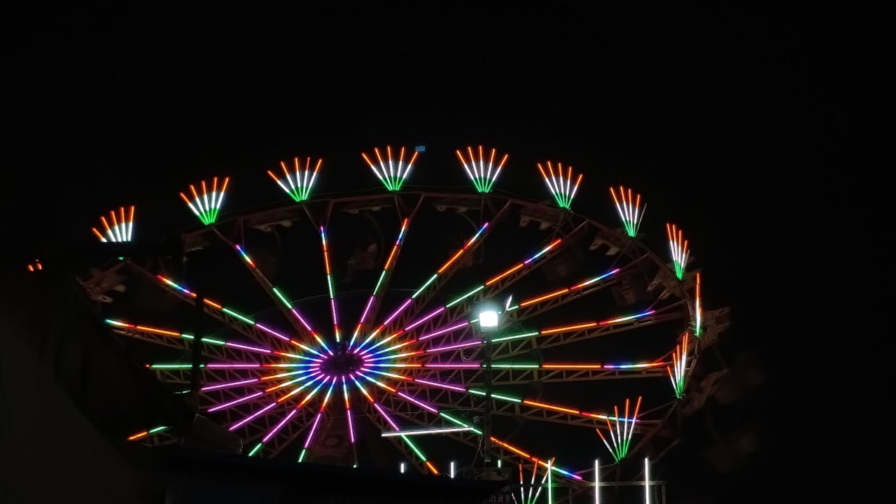 Just me & the night carnival glow 🌟.