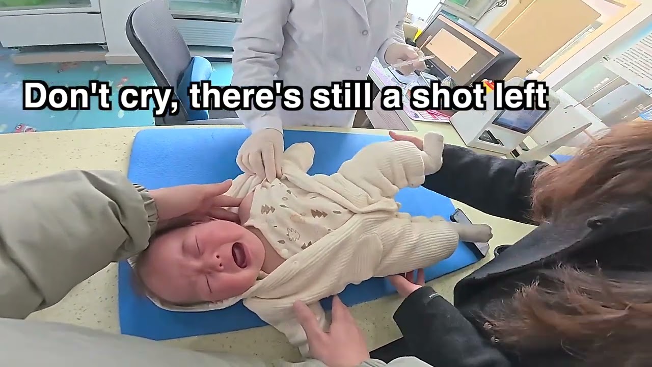 The baby cried after receiving two injections.