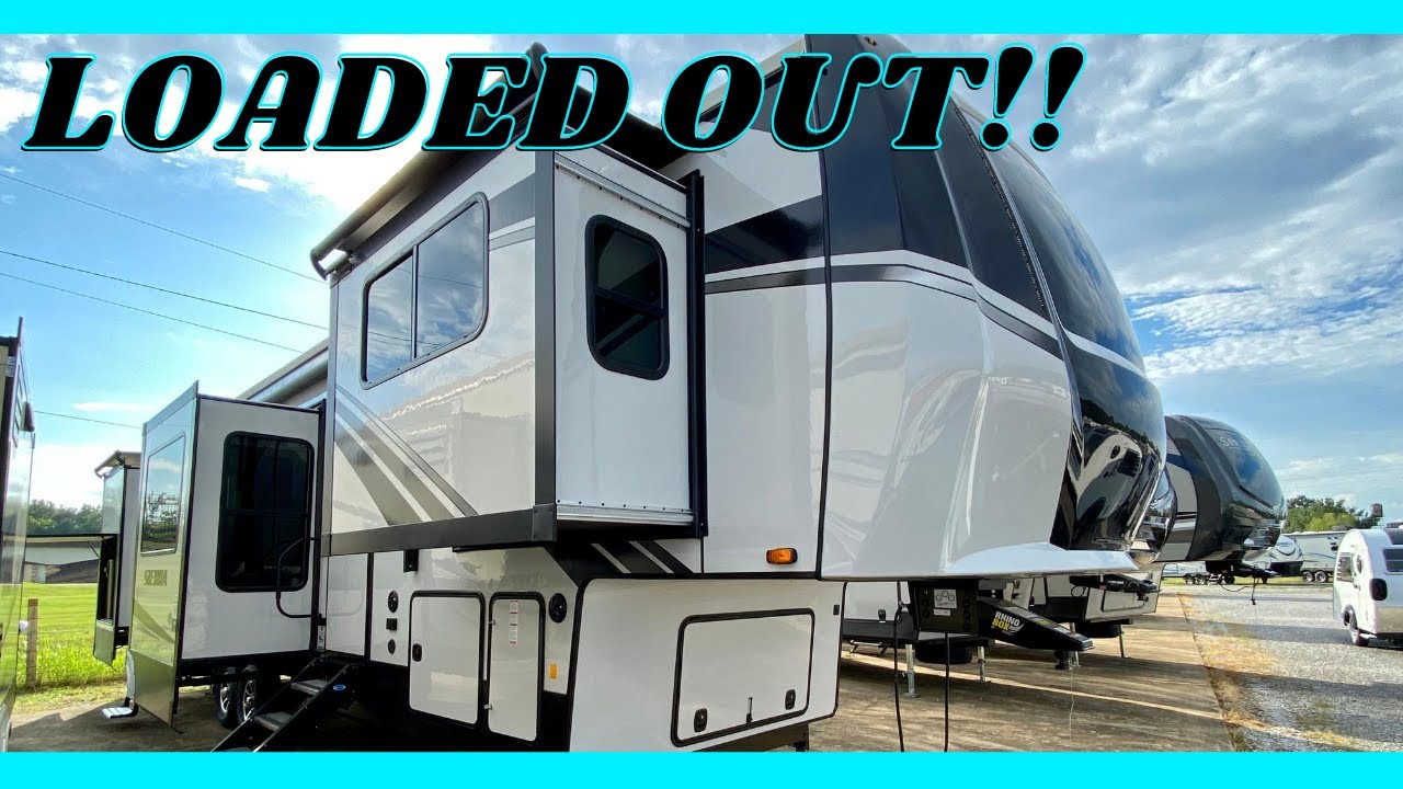 This NEW 5th wheel camper is LOADED OUT! Outside kitchen on this Sierra Camper! Camper Masters Tour