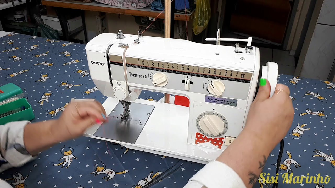 pasando hilo en la maquina y llenar la bobina /Brother Prestige 30.