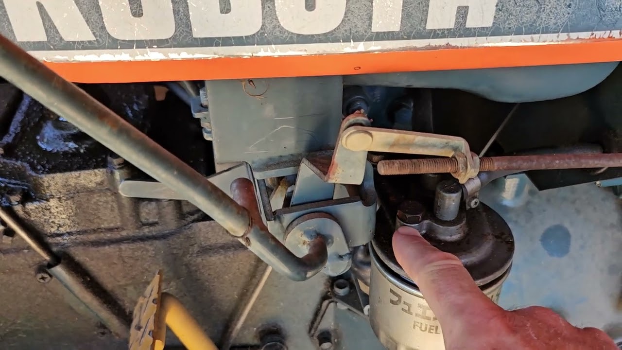 Changing and bleeding fuel filters on older model tractors - Kubota
