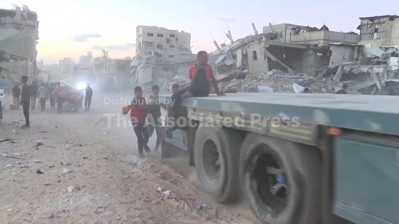 Palestinians still struggle to get aid while the ceasefire holds for the third day in Gaza