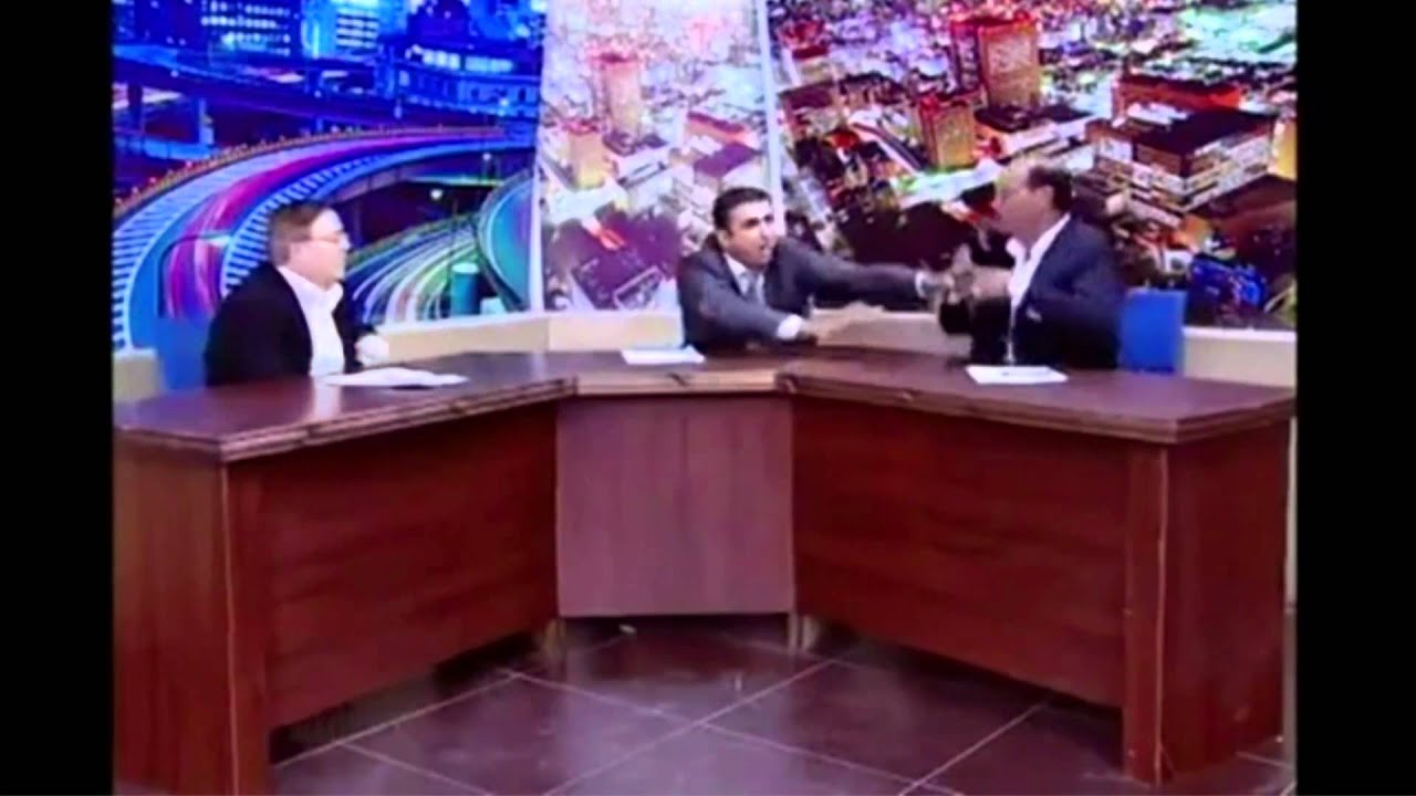 Politician Pulls Gun During TV Show Fight
