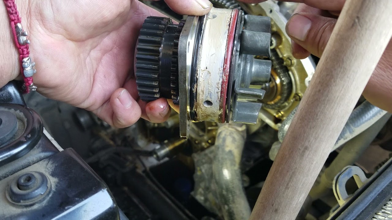 2006 Nissan frontier with low oil pressure part 4 oil pump and water pump removal