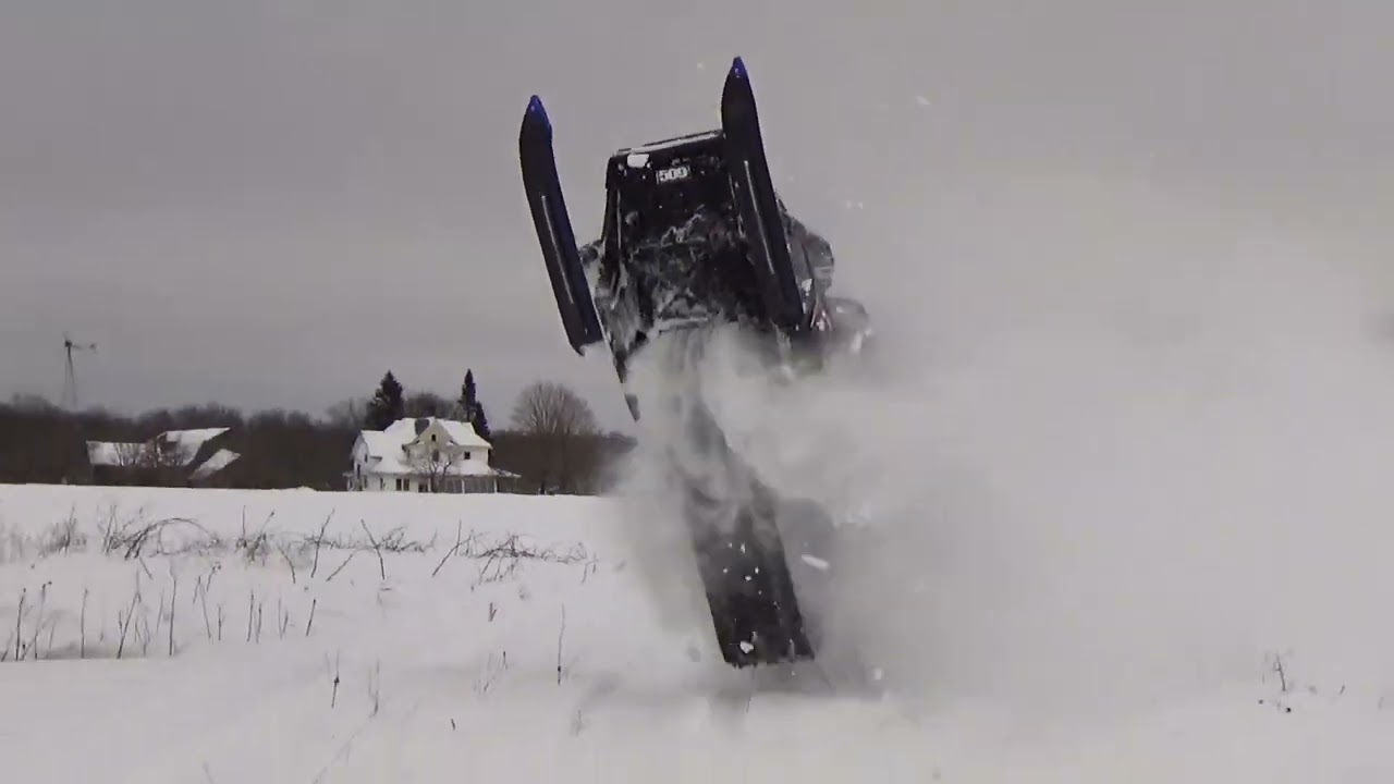 Yamaha Phazer Snowmobile Jumps and Wheelies