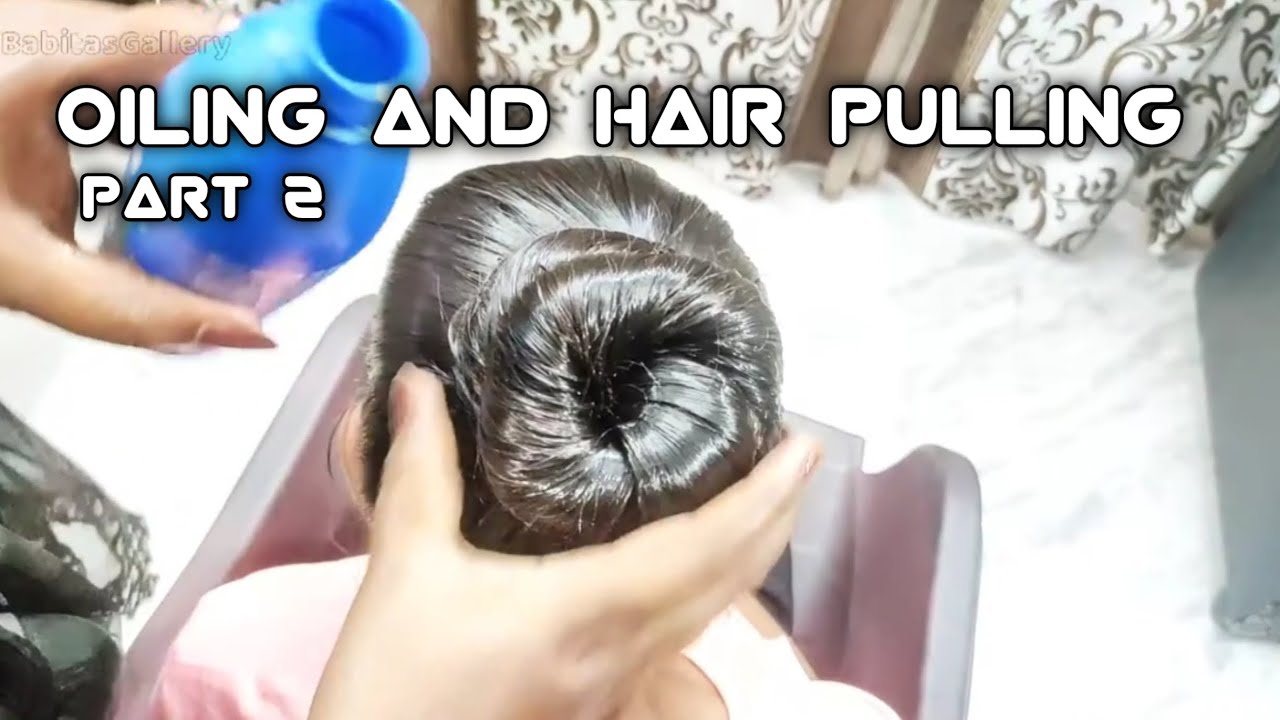 Girl long hair oiling and massage pulling / hair  massage /oil massage 