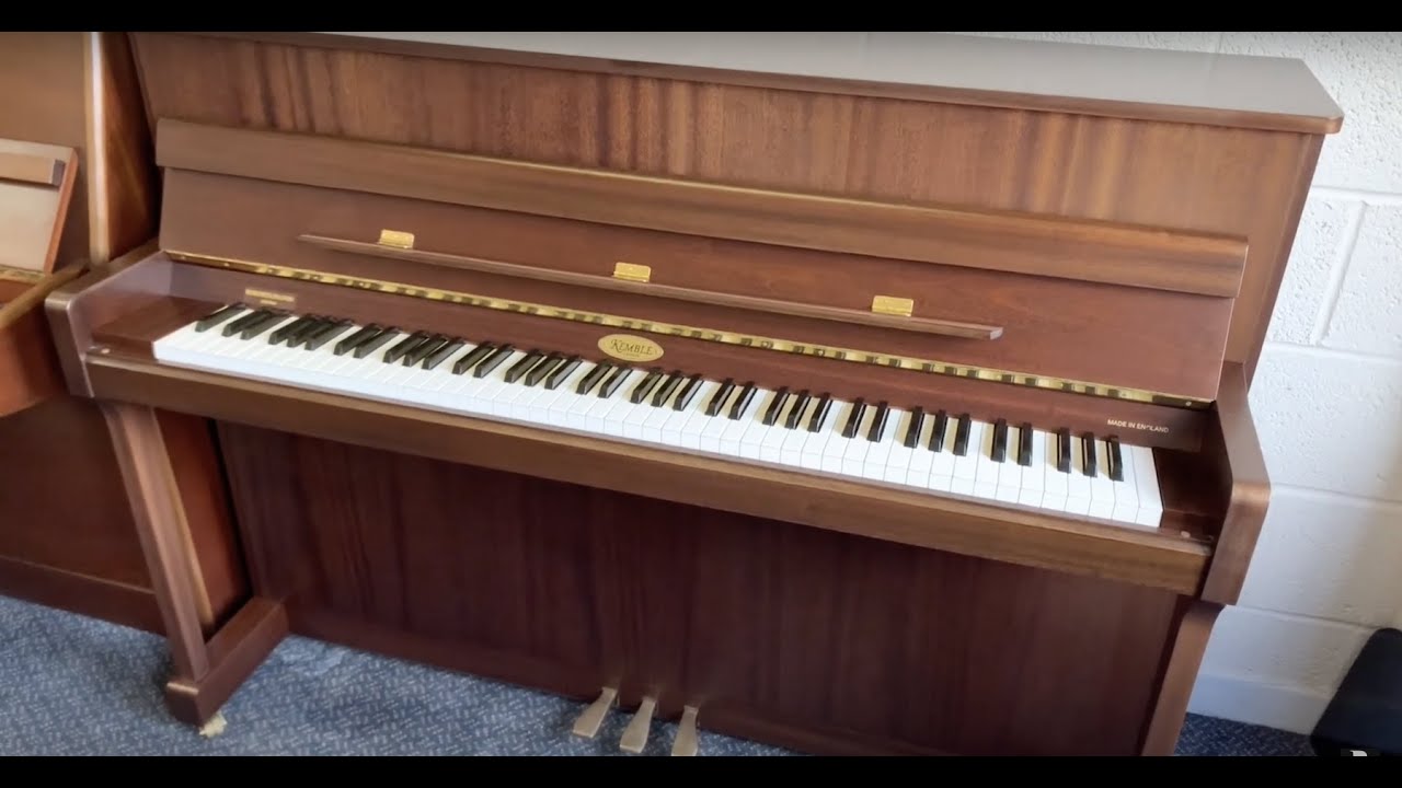 Kemble Oxford 2004 in matt walnut; cf small Welmar and new Kawai.