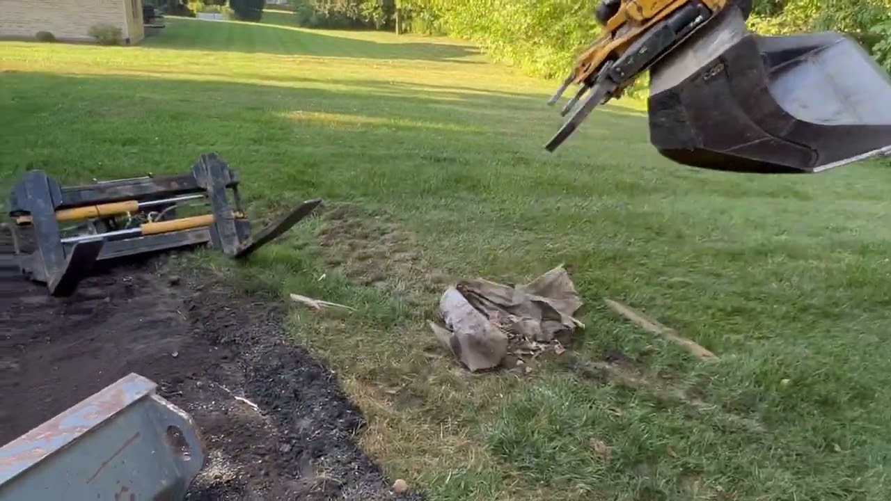 Building a paver patio start to finish with an Engcon tilt rotator.