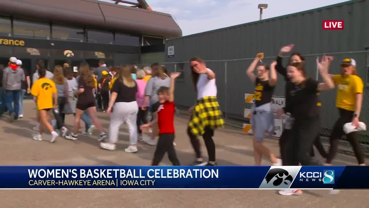 KCCI's Beau Bowman outside Carver-Hawkeye Arena before the Iowa women's basketball celebration