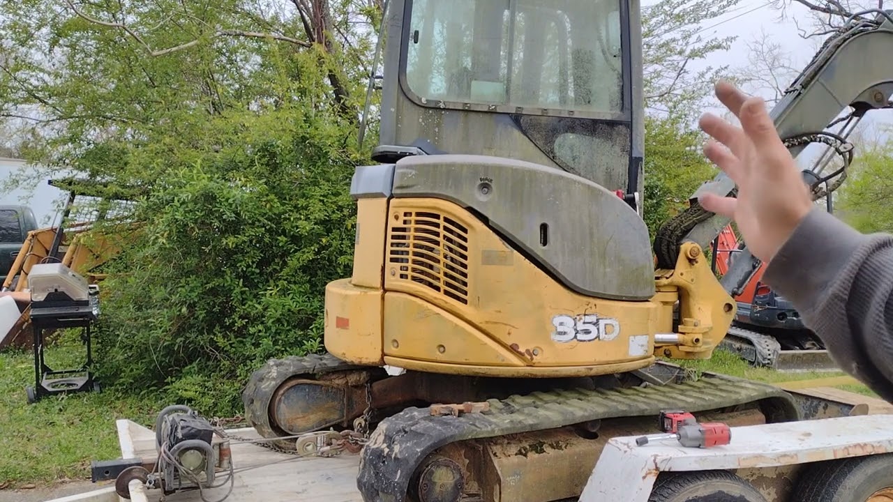 наклон кабины мини-экскаватора John Deere 35D