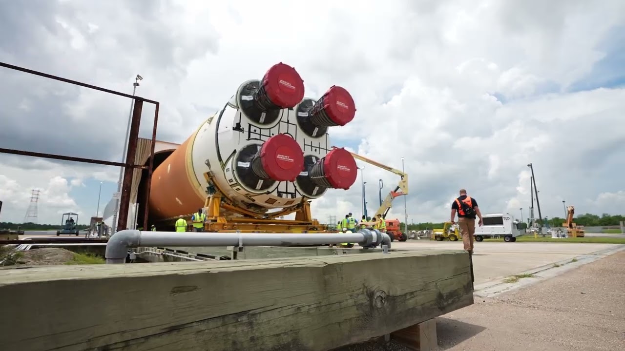 Space Launch System Core Stage for Artemis II Rocket Loaded onto Pegasus Barge