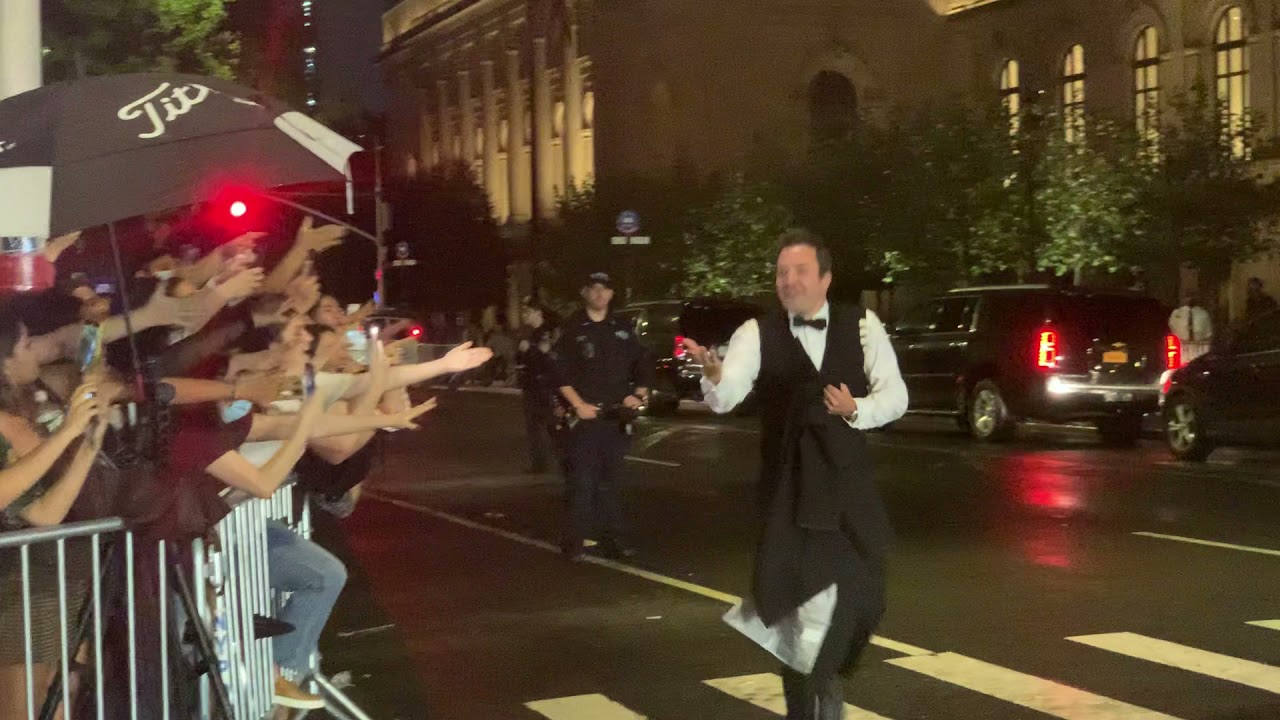 Jimmy Fallon Climbs Over Barricade to Greet Fans at Met Gala