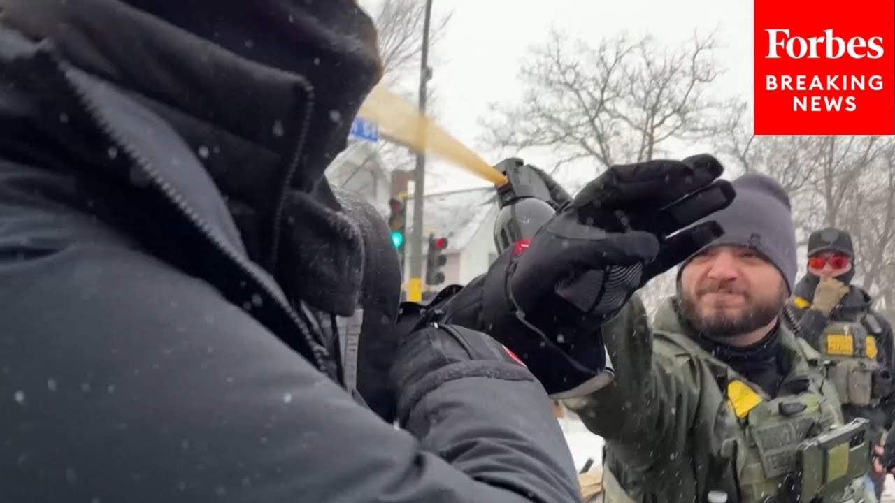 ICE Agents Drag Out Person Out Of Car, Deploy Pepper Spray During Clash With Protesters In Minnesota