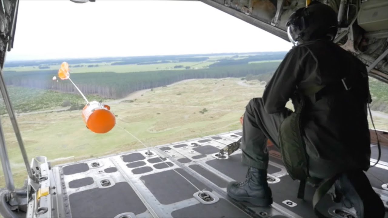 C-130 deploying the new life raft for the Airforce