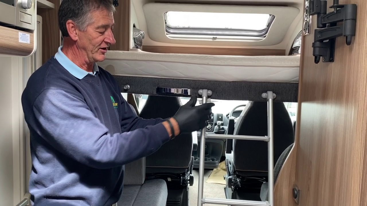 Drop down bed demonstration in a  Swift Escape