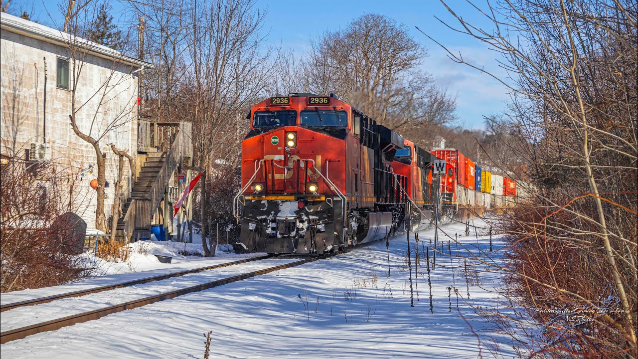 CN 2936 Leads a CN Z120 Through the Downtown of Bedford, NS.