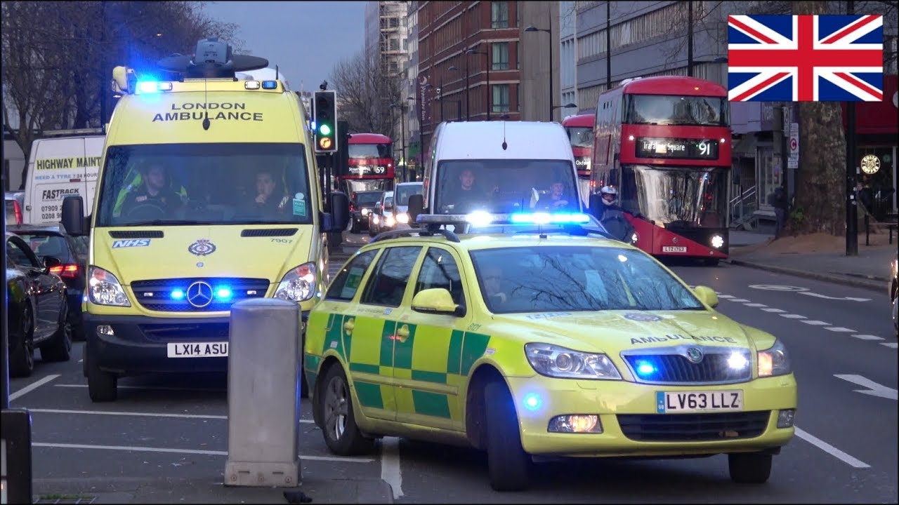 Command Support + London Ambulance car responding with siren and lights