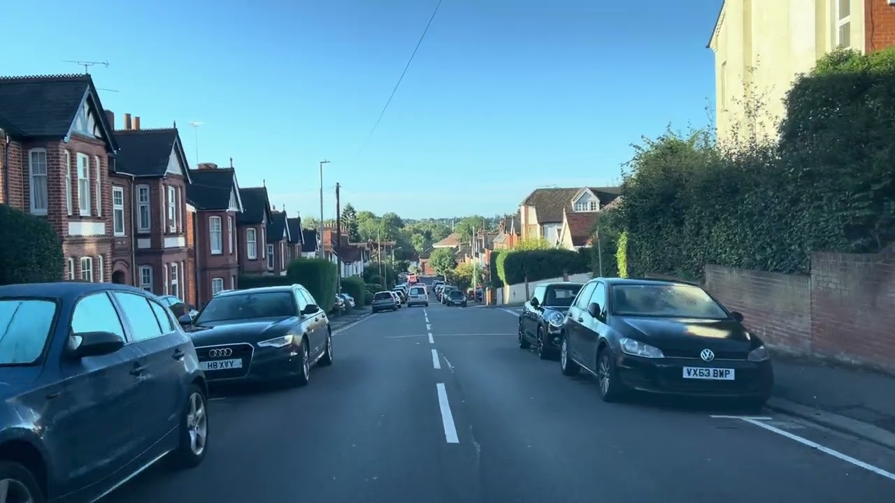 School run city commute through Reading, Berkshire, England in Autumn