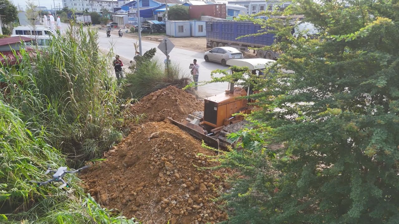 Wonderful Project Start! Skilled Bulldozer & Dump Truck Push Stone & Soil in Land Filling Operation