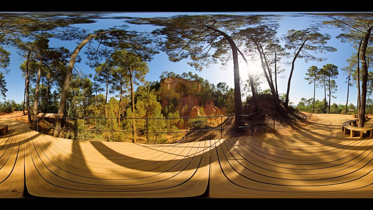 360° STOCK VIDEO 4K | Viewing Platform Surrounded By Pine Trees In Ochre Landscape | Atmosphaeres