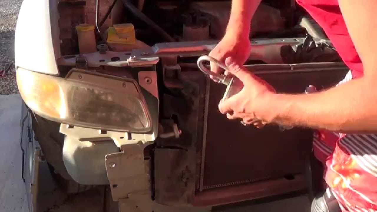 2000 voyager A/C condenser and bumper rebar replacment