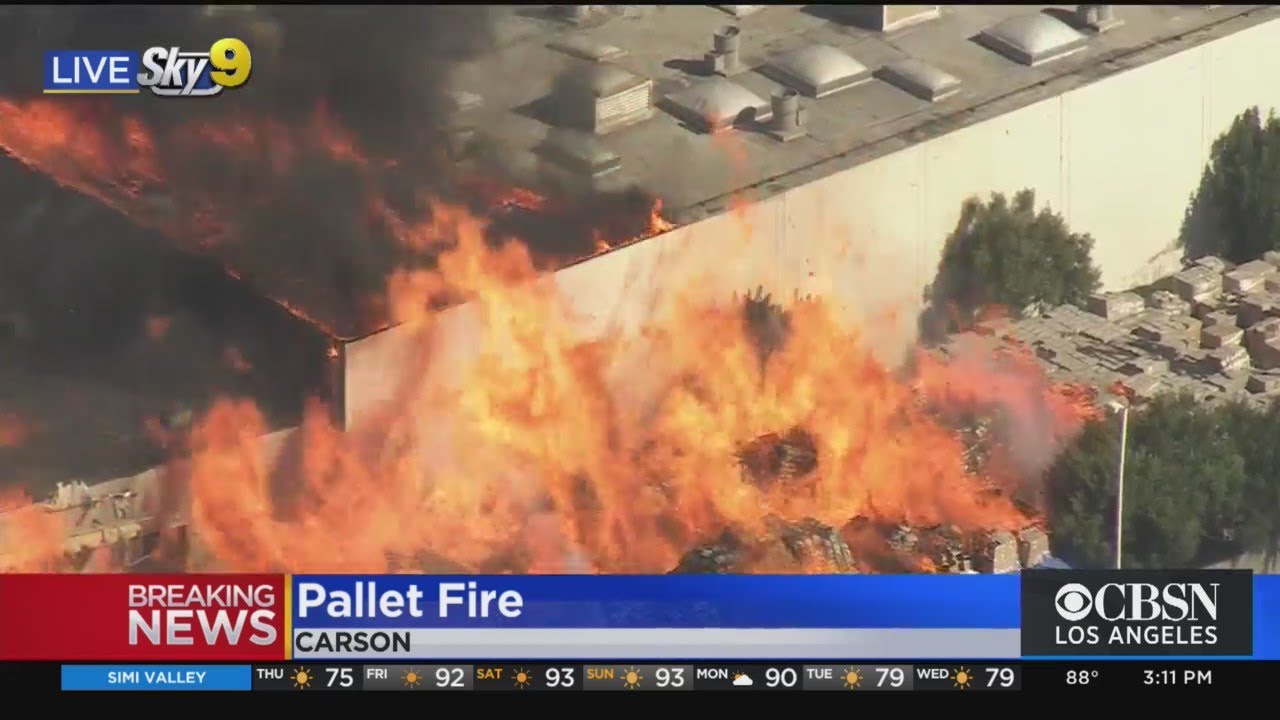 Pallet Yard Fire Spreading To Industrial Buildings In Carson