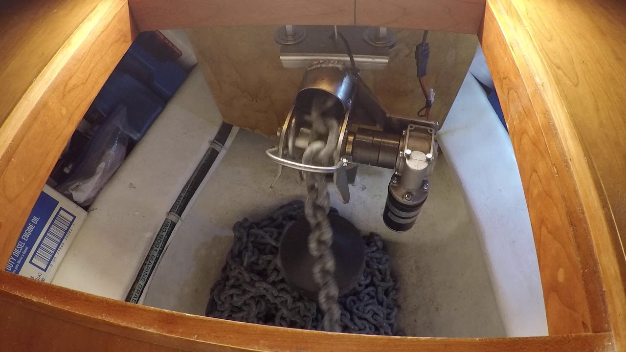 Anchor chain assist roller and chain flaker