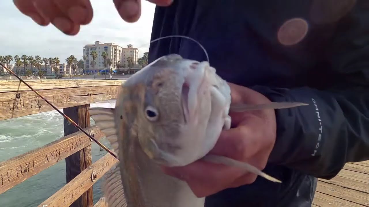 Fishing croaker with my fishing coach Danny.