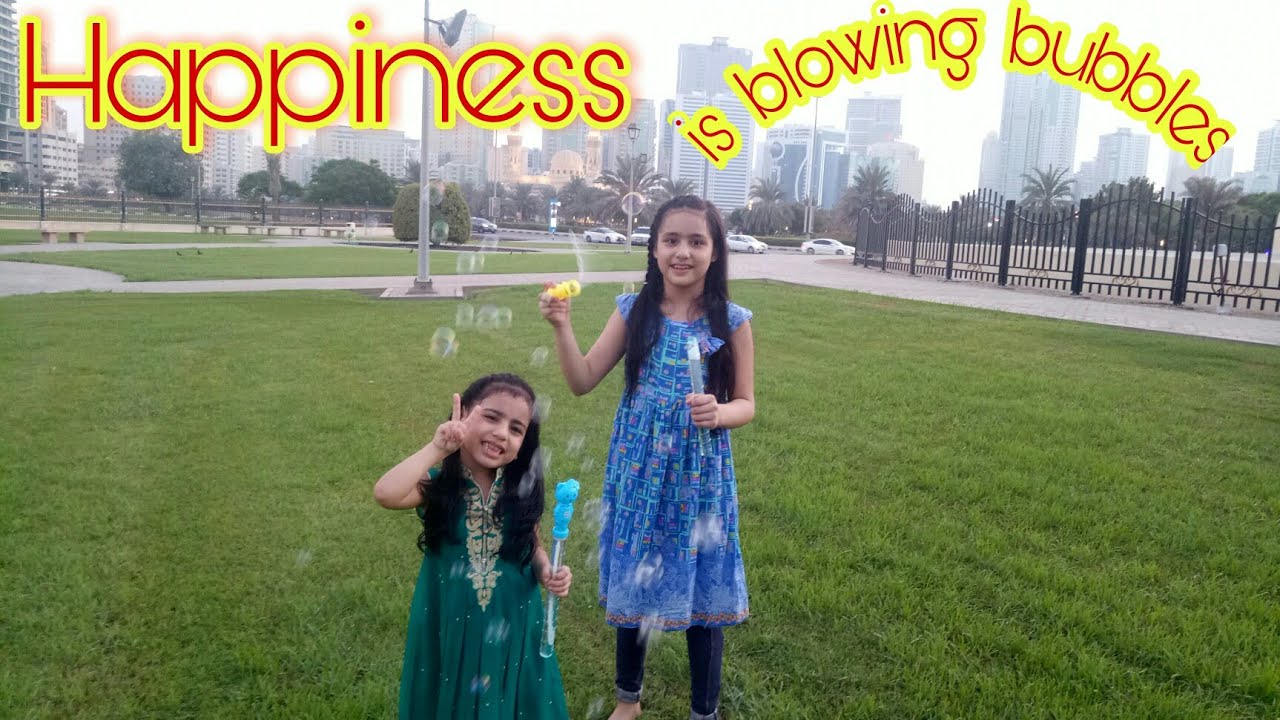 Happiness is BLOWING BUBBLES #filipinopakistanikids #sistersbonding #blowingbubbles #laughterandjoy