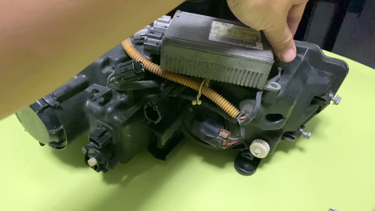 R34 GTR headlight housing replacement