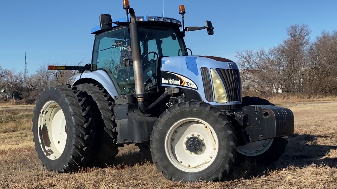 SOLD *2005 NH TG210 MFWD 210hp Tractor