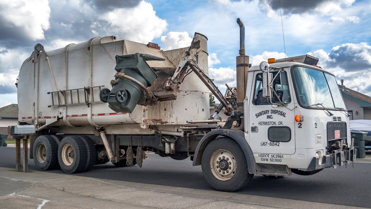 WhiteGMC WXLL - Heil Rapid Rail Garbage Truck