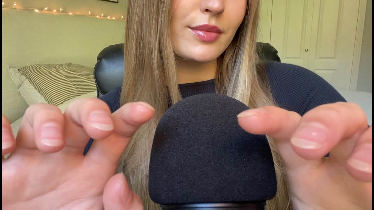 asmr finger flutters, lens tapping, and inaudible whispers with repetition