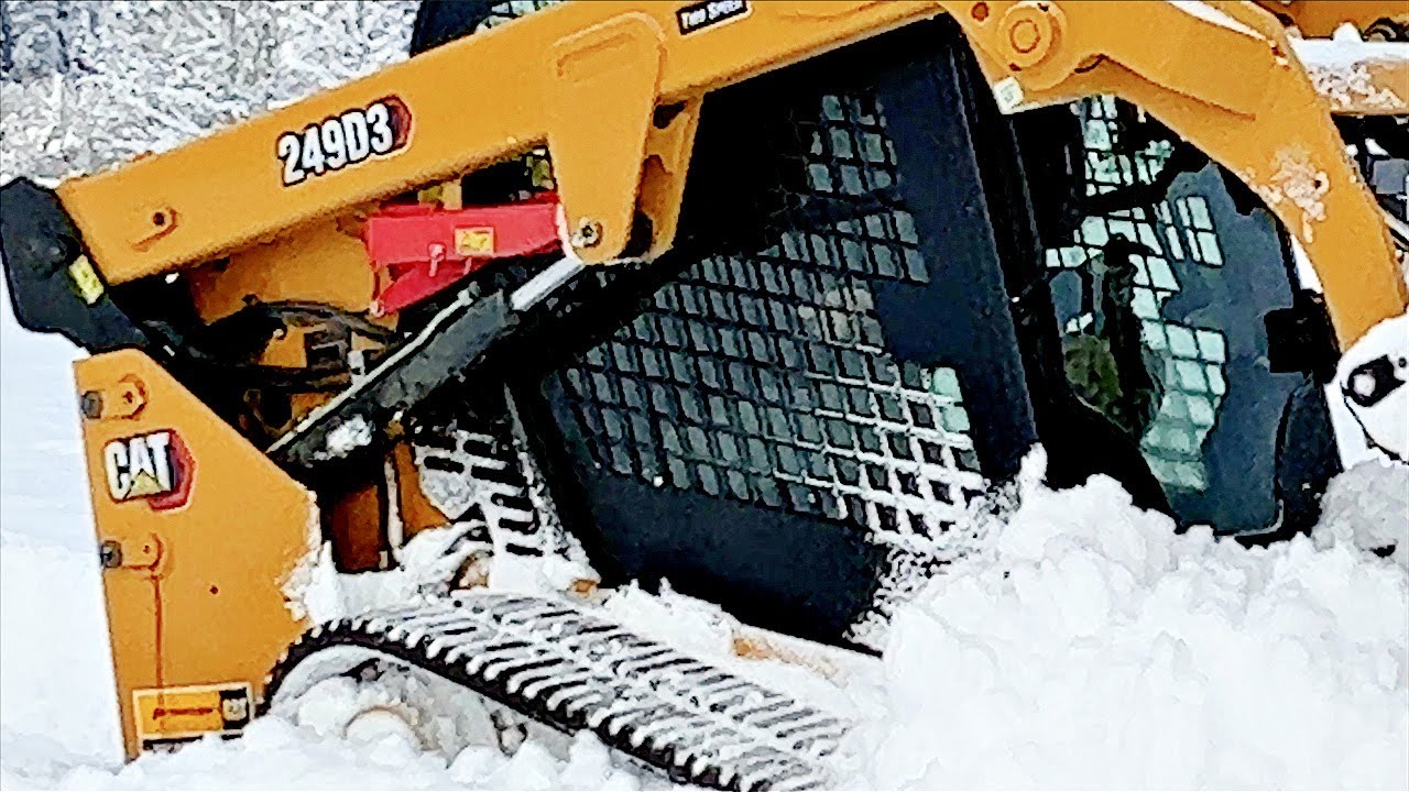 Caterpillar Tractor In Deep Snow