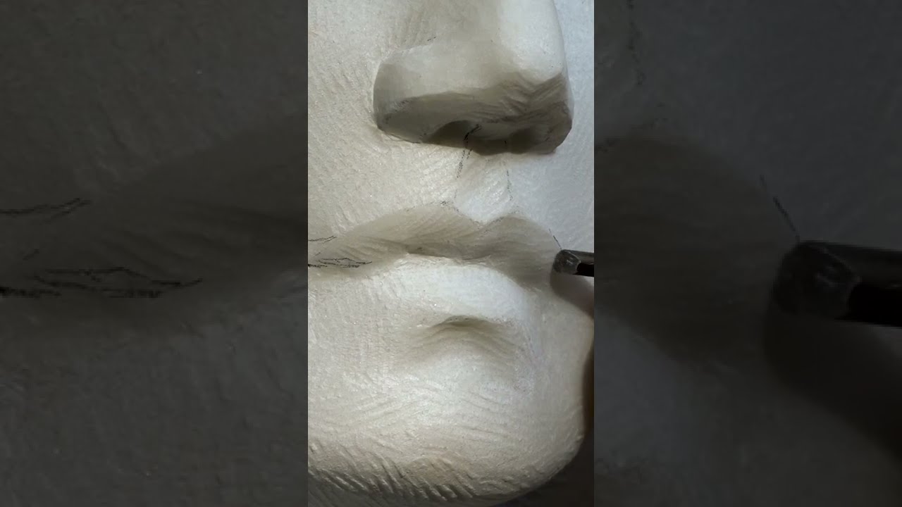Carving a mouth in marble